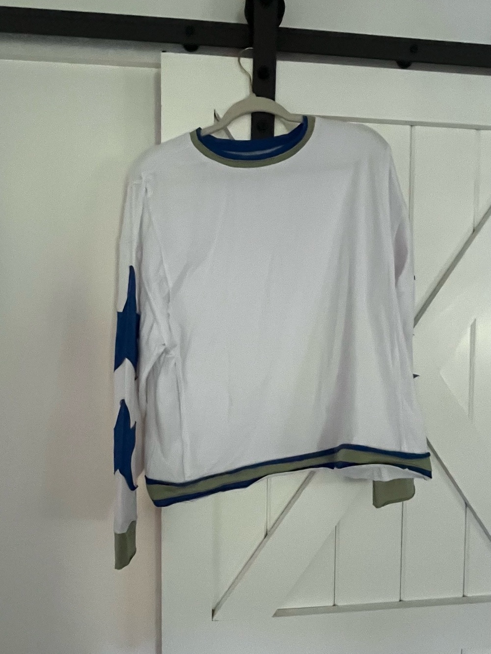 White Long-Sleeve Crewneck Top with Blue Star Sleeve Accents